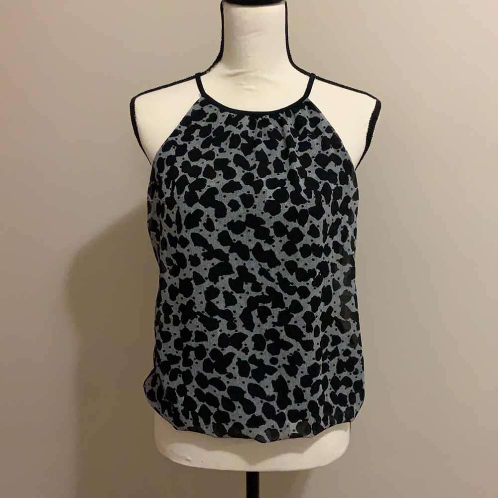 Like new black and white sleeveless top